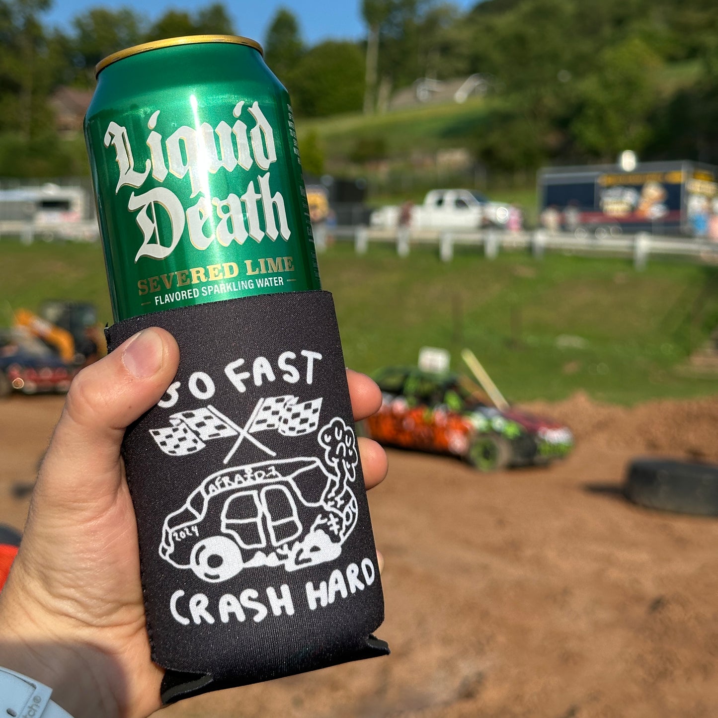 GO FAST . CRASH HARD DRINK KOOZIE - BLACK